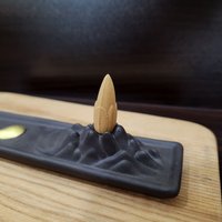 Ceramic censer | backflow smoke | black color | boat with golden buffalo design photo 1