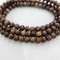 Vòng tay trầm hương 108 hạt 6 mm – trầm hương Việt Nam dạng “banh” từ Tiên Lãnh và Tiên Ngọc, thanh gọn và phù hợp với cổ tay nữ photo 4