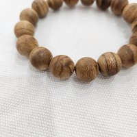 17-Bead Agarwood Bracelet 12 mm – ant-worked agarwood with bright natural wood tones photo 2