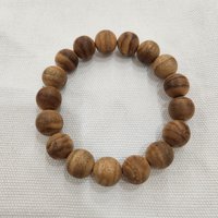 17-Bead Agarwood Bracelet 12 mm – ant-worked agarwood with bright natural wood tones